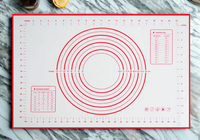 silcone pastry mat on marble counter